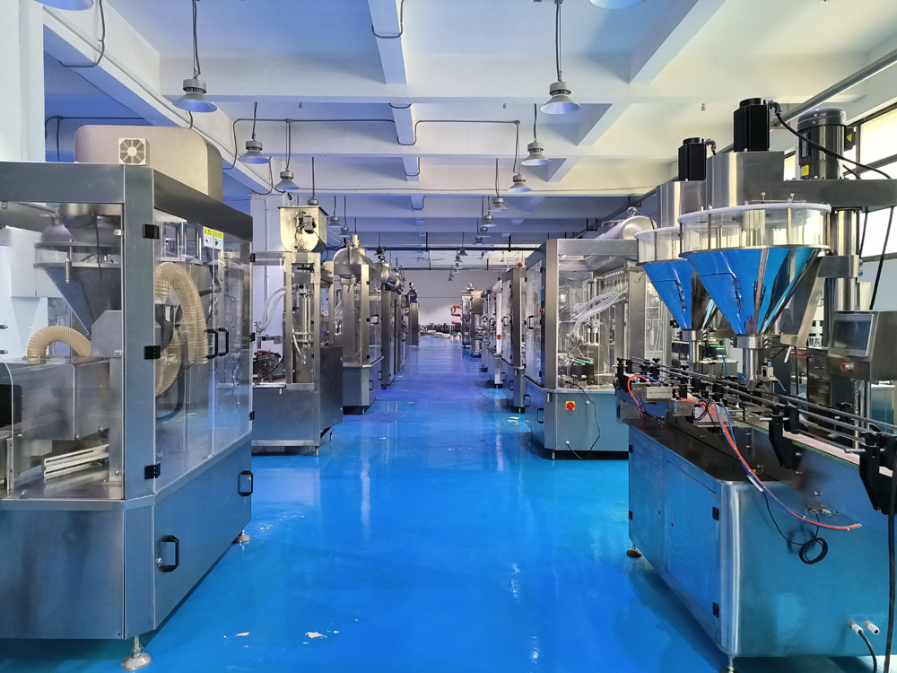 全自動粉劑灌裝機、液（yè）體灌裝機車間